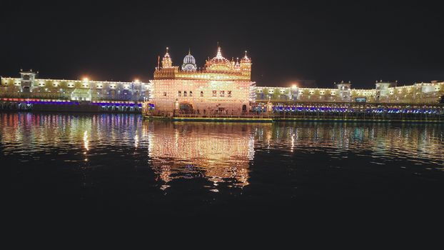 The Golden Temple or Harmandir Sahib or Darbar Sahib Gurdwara, the religious preeminent holy spiritual pilgrimage site of Sikhism. Amritsar, Punjab, India. South Asia Pacific October 2020.