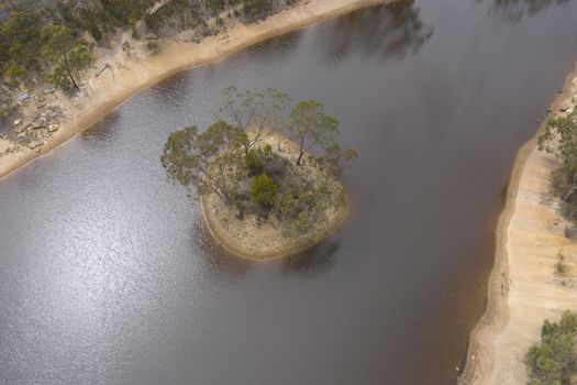 Aerial view of a drought affected water reservoir in regional Australia