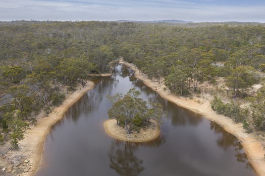 Aerial view of a drought affected water reservoir in regional Australia