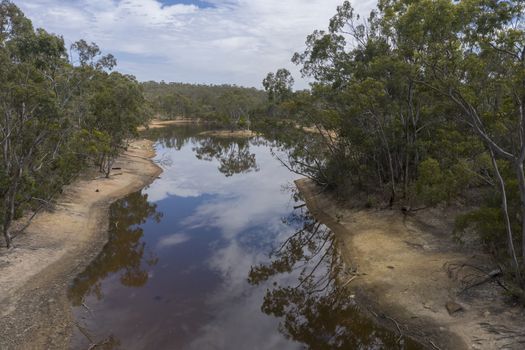 Aerial view of a drought affected water reservoir in regional Australia