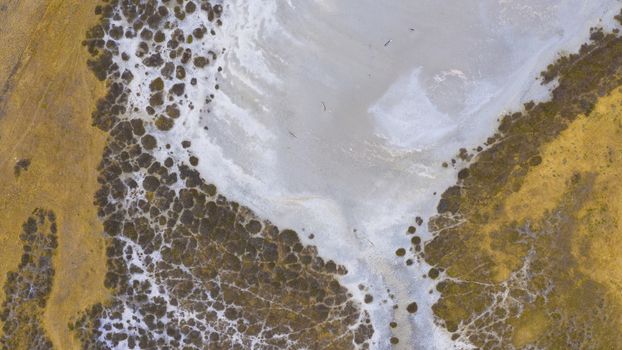 Aerial view of a water reservoir affected by drought in regional Australia