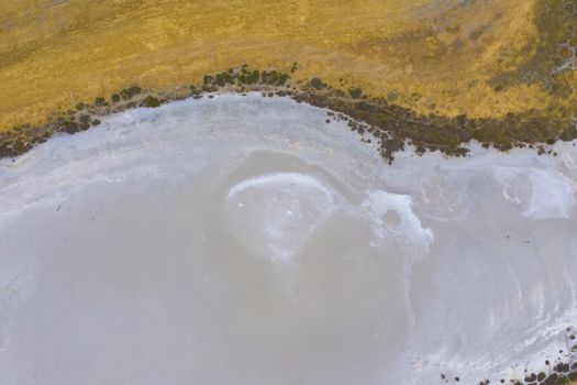 Aerial view of a water reservoir affected by drought in regional Australia