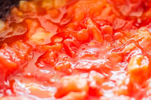 Cooking tomato sauce, closeup steamed vegetables for cook book or food blog backgrounds