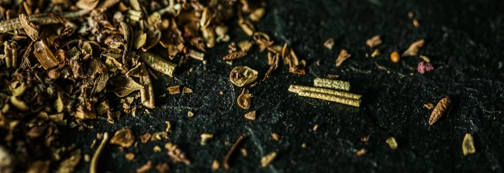 Provencal spices mix closeup on luxury stone background as flat lay, dry food spices and recipe ingredients