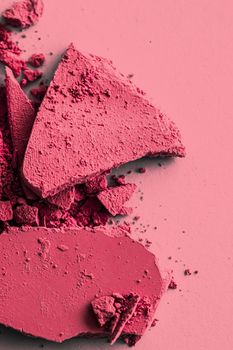 Red eye shadow powder as makeup palette closeup, crushed cosmetics and beauty textures