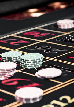 Betting and playing roulette in casino, gambling ads