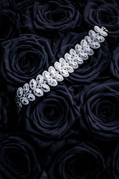 Luxe branding, glamour fashion and boutique shopping concept - Luxury diamond jewelry bracelet and black roses flowers, love gift on Valentines Day and jewellery brand holiday background design