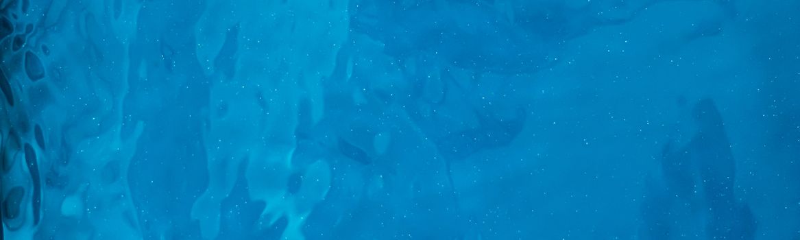 Blue water texture as abstract background, swimming pool and waves designs