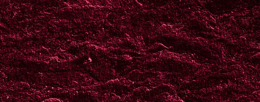 Red stone texture as abstract background, design material and textured surfaces