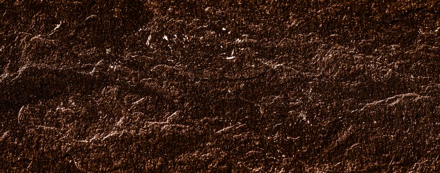 Brown stone texture as abstract background, design material and textured surfaces