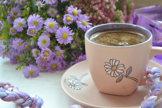 Aroma coffee cup with purple little flowers, lavender, purple and white color of image