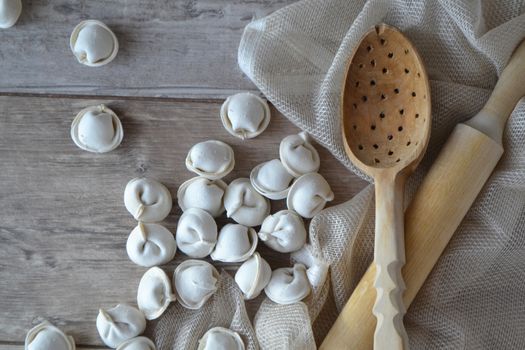 Russian traditional ravioli or homemade dumplings, pelmeni.