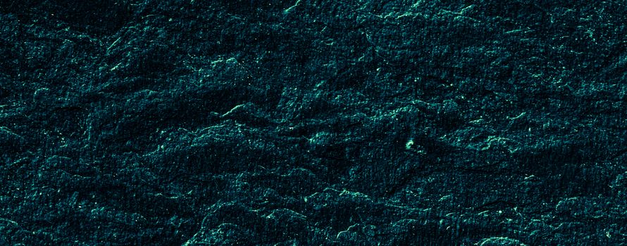 Emerald green stone texture as abstract background, design material and textured surfaces