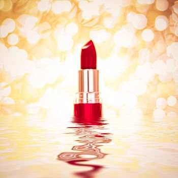 Red lipstick on golden background, make-up and cosmetics product