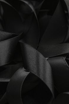 Black silk ribbon as background, abstract and luxury brand designs