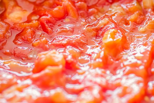 Cooking tomato sauce, closeup steamed vegetables for cook book or food blog backgrounds