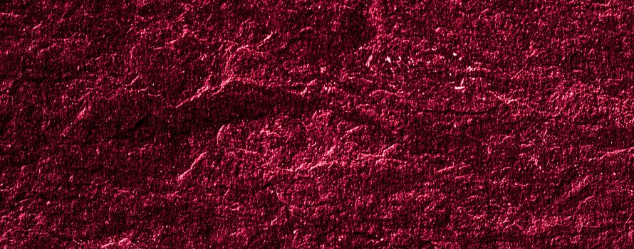 Red stone texture as abstract background, design material and textured surfaces