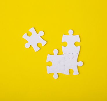 White jigsaw puzzle pattern background. jigsaw puzzle