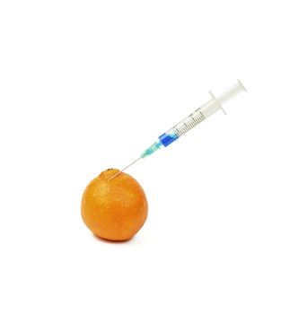 On a white background is the Mandarin stuck with a needle of a medical syringe with blue liquid