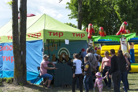 Belarus, Minsk - 27.05.2017: the tent with the inscription "TIR" were people shooting from the pneumatic weapon