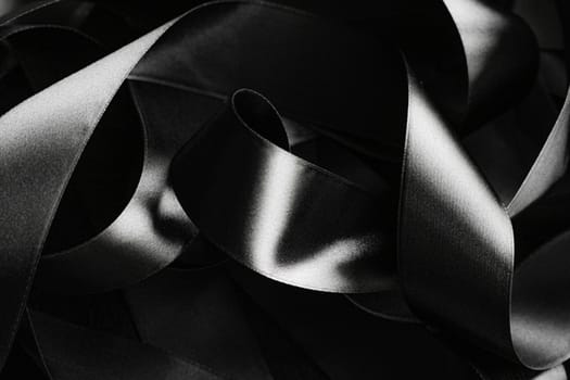 Black and white silk ribbon as background, abstract and luxury brand designs