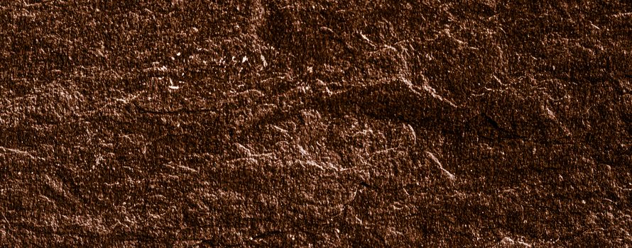 Brown stone texture as abstract background, design material and textured surfaces