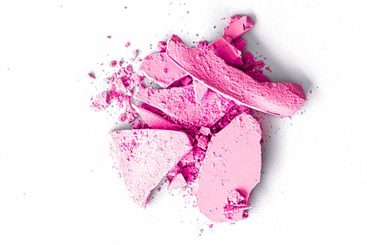 Pink eye shadow powder as makeup palette closeup isolated on white background, crushed cosmetics and beauty textures