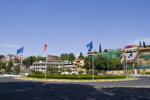 European square view, Georgian and european union flags, square in old town and city center of Tbilisi, Georgia