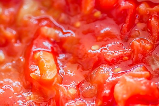 Cooking tomato sauce, closeup steamed vegetables for cook book or food blog backgrounds