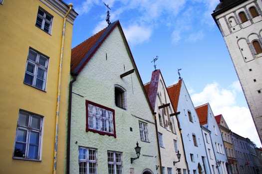 TALLINN, ESTONIA - OCTOBER 20, 2017: Buildings and architecture exterior view in old town of Tallinn, colorful old style houses and street situation.