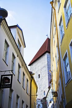 TALLINN, ESTONIA - OCTOBER 20, 2017: Buildings and architecture exterior view in old town of Tallinn, colorful old style houses and street situation.