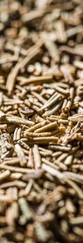 Rosemary closeup on luxury stone background as flat lay, dry food spices and recipe ingredients