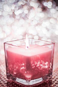 Festive decoration, branding and aromatherapy spa concept - Rose aromatic candle on Christmas and New Years glitter background, Valentines Day luxury home decor and holiday season brand design