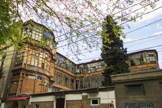 TBILISI, GEORGIA - APRIL 28, 2019: Old famous building exterior in old town and city center of Tbilisi.