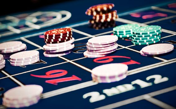 Betting and playing roulette in casino, gambling ads