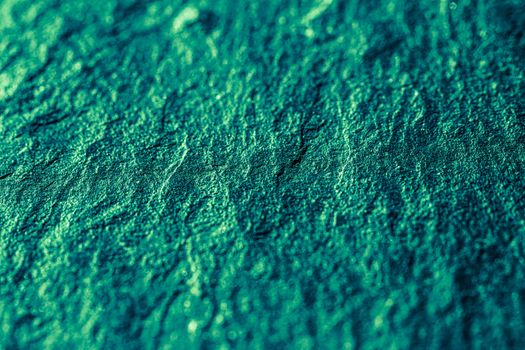 Emerald green stone texture as abstract background, design material and textured surfaces