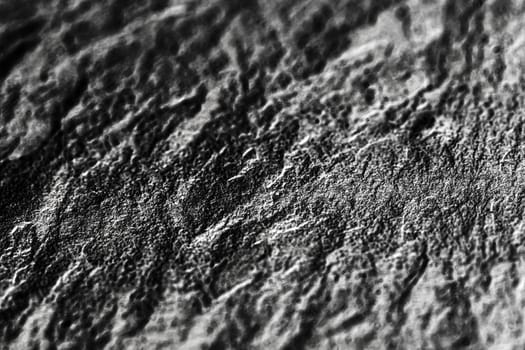 Light stone texture as abstract background, design material and textured surfaces