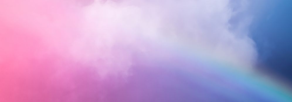 Rainbow in fantasy pink and blue sky, spiritual and nature backgrounds