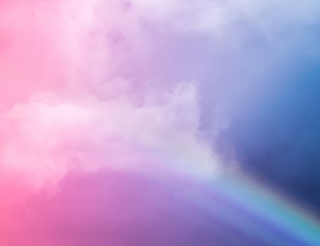 Rainbow in fantasy pink and blue sky, spiritual and nature backgrounds