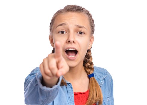 Happy teenage girl pointing up, gesturing idea or doing number one gesture, isolated on white background