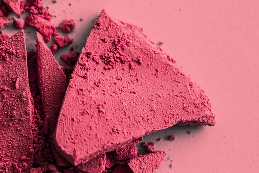 Red eye shadow powder as makeup palette closeup, crushed cosmetics and beauty textures