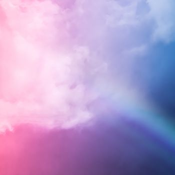Rainbow in fantasy pink and blue sky, spiritual and nature backgrounds
