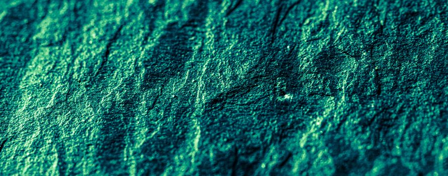 Emerald green stone texture as abstract background, design material and textured surfaces