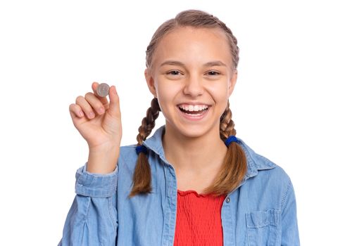 Happy teenage girl holding coin, isolated on white background