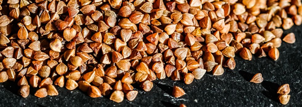 Buckwheat grain closeup, food texture and cook book backgrounds