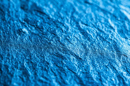 Blue stone texture as abstract background, design material and textured surfaces