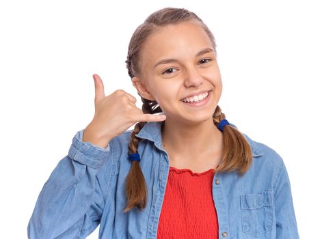 Smiling teenage girl with phone shaped hand, isolated on white background