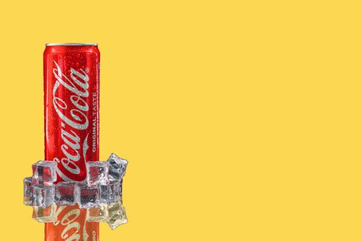 Kuala Lumpur, Malaysia - October 19, 2020 : Coca Cola or Coke Drink on yellow background