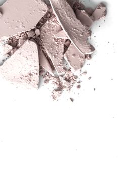 Pale eye shadow powder as makeup palette closeup isolated on white background, crushed cosmetics and beauty textures