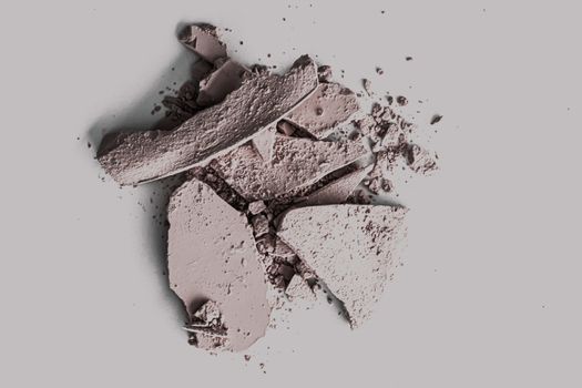 Pale eye shadow powder as makeup palette closeup, crushed cosmetics and beauty textures